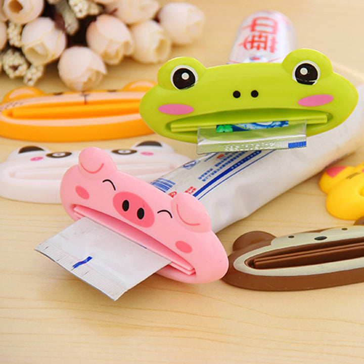 1pcs Animal Easy Toothpaste Dispenser Plastic Tooth Paste Tube Squeezer Useful Toothpaste Rolling Holder For Home Bathroom freeshipping - Etreasurs