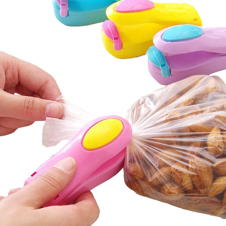 HOMETREE Mini Handheld Holder Electric Heating Snack Sealing Machine Machine Sealed Packaging Plastic Bag Sealed Food Bag H274 freeshipping - Etreasurs